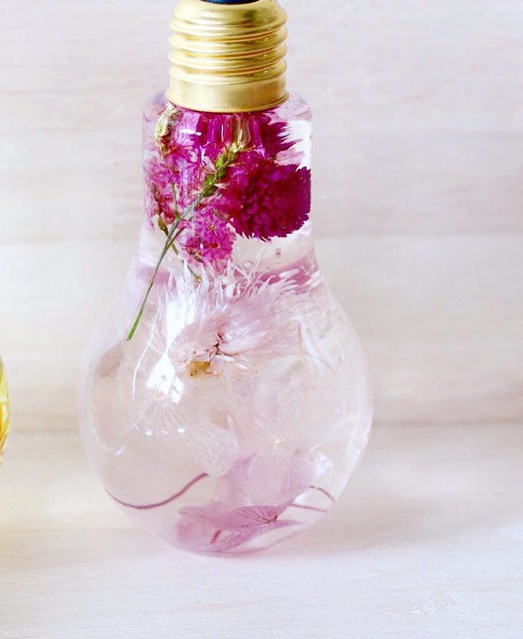 Striking Flower Light Bulb Vase Suspends Delicate Blooms Like Jewels