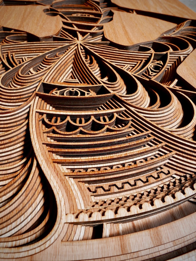relief wood sculptures cut laser patterns gabriel schama intricate wooden plywood geometric sculpture embedded mandalas artist create mandala cutter fubiz