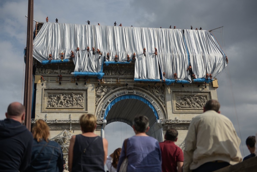 Artists Wrap Paris Iconic Arc De Triomphe With Shimmering Fabric