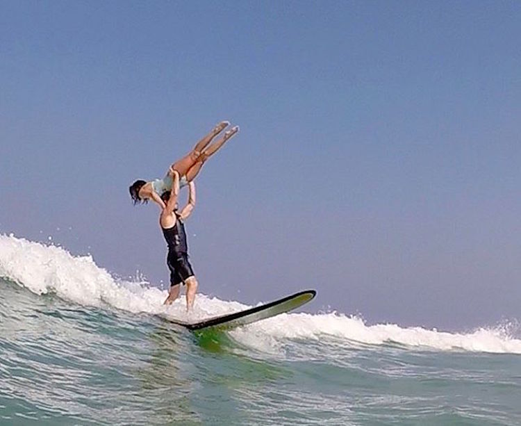 A Couple's Impressive Tricks On A Surf Board