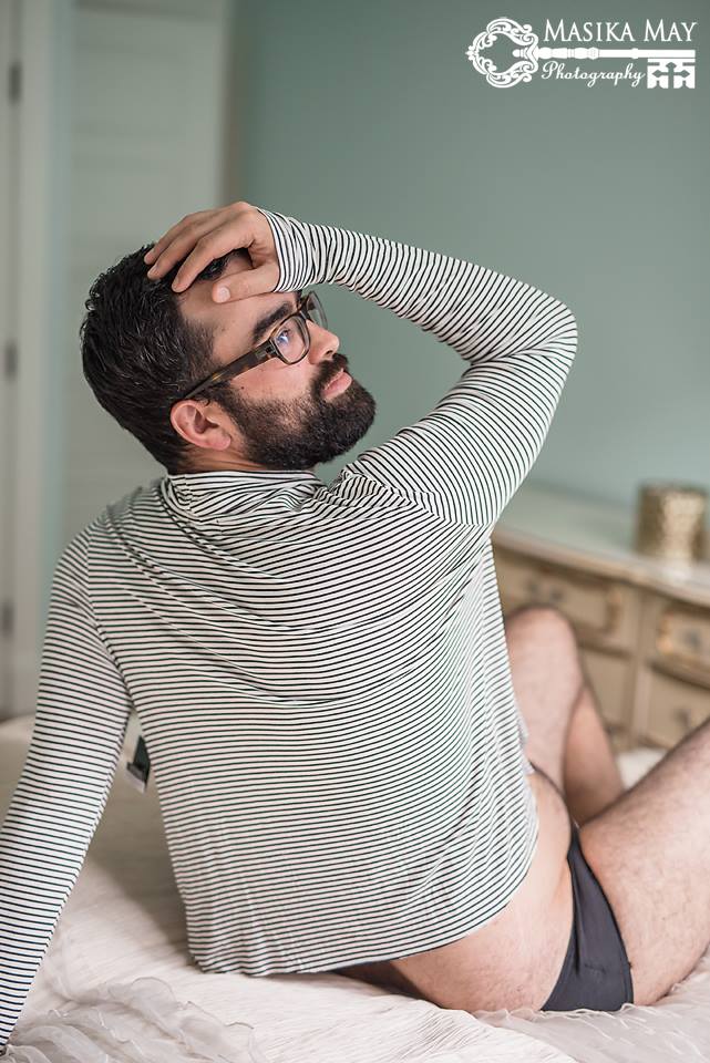 Husband Playfully Poses For The Man Version Of A Sexy Boudoir Photo Shoot