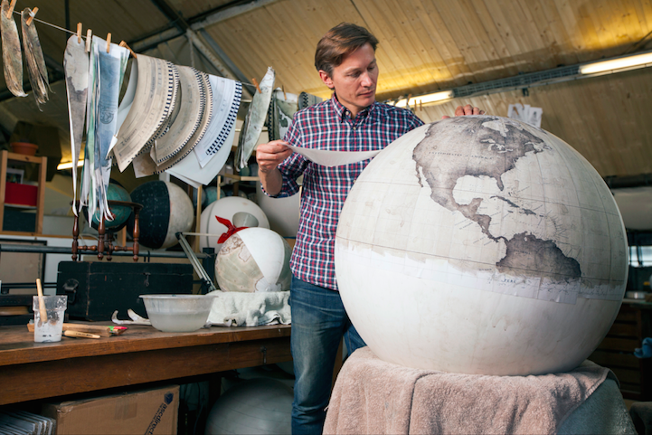 Man Making a Globe