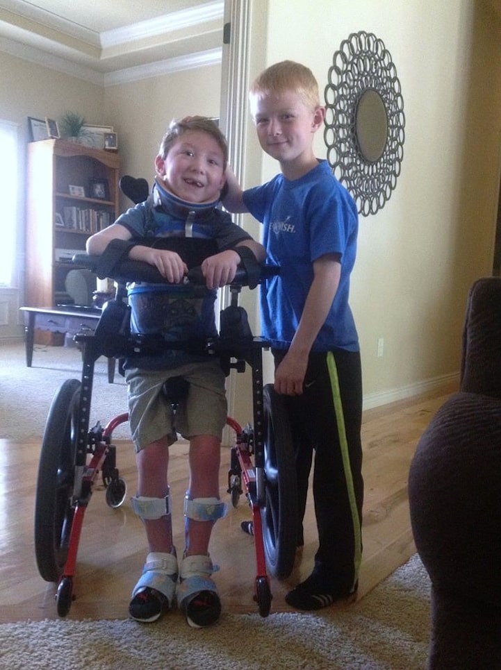 8-Year-Old Carries His Disabled Brother Through Their First Triathalon