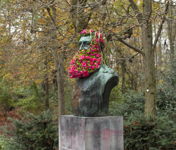 Flowers on public statues