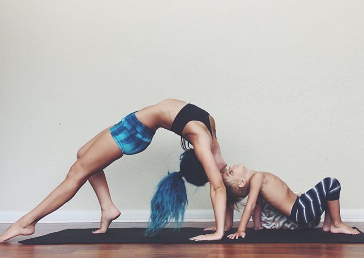 Mom Practice Family Yoga with the Help of Her Two Kids