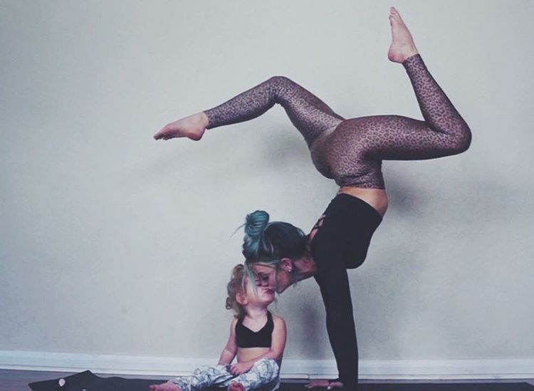 Mom Practice Family Yoga with the Help of Her Two Kids