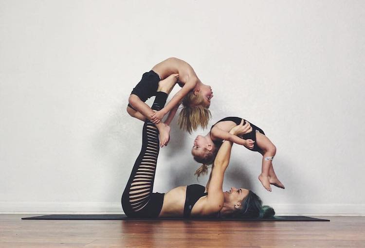 Mom Practice Family Yoga with the Help of Her Two Kids