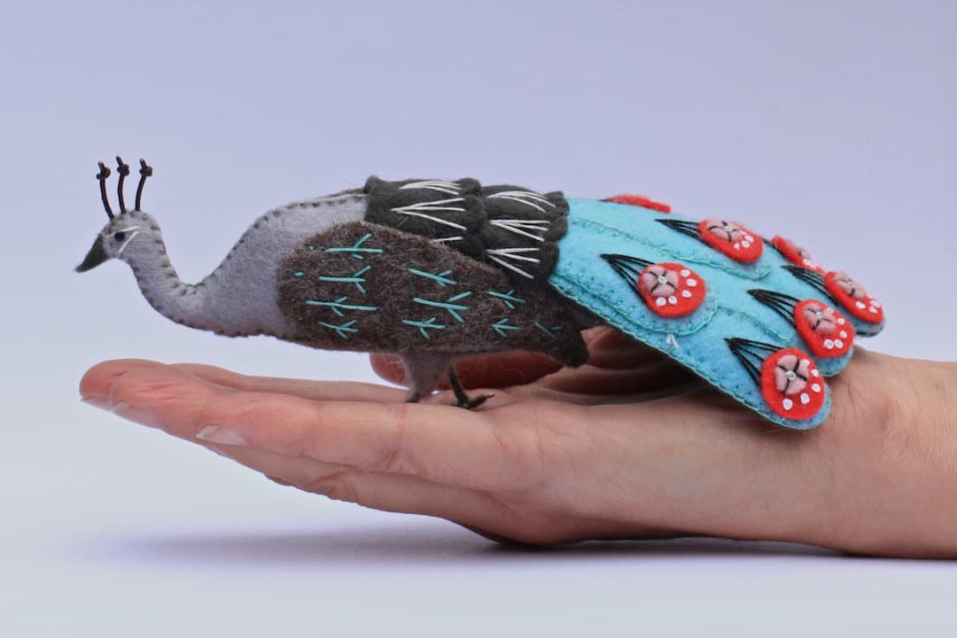 Felt Birds Sculptures With Detailed Peacock Feathers by Jill Ffrench