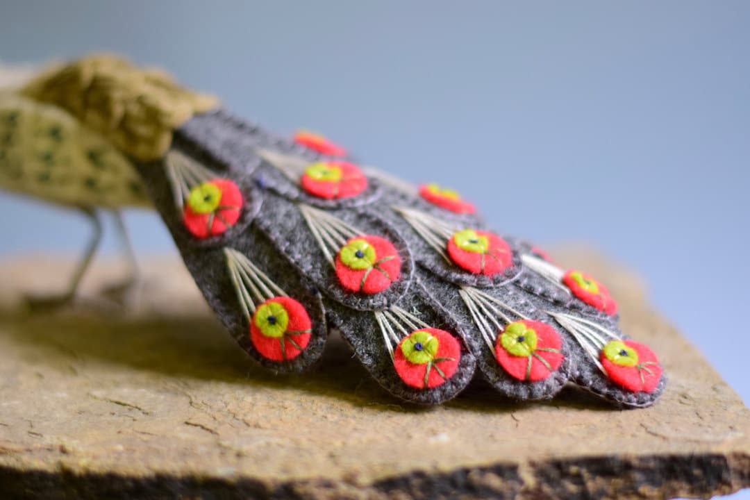 Felt Birds Sculptures With Detailed Peacock Feathers by Jill Ffrench