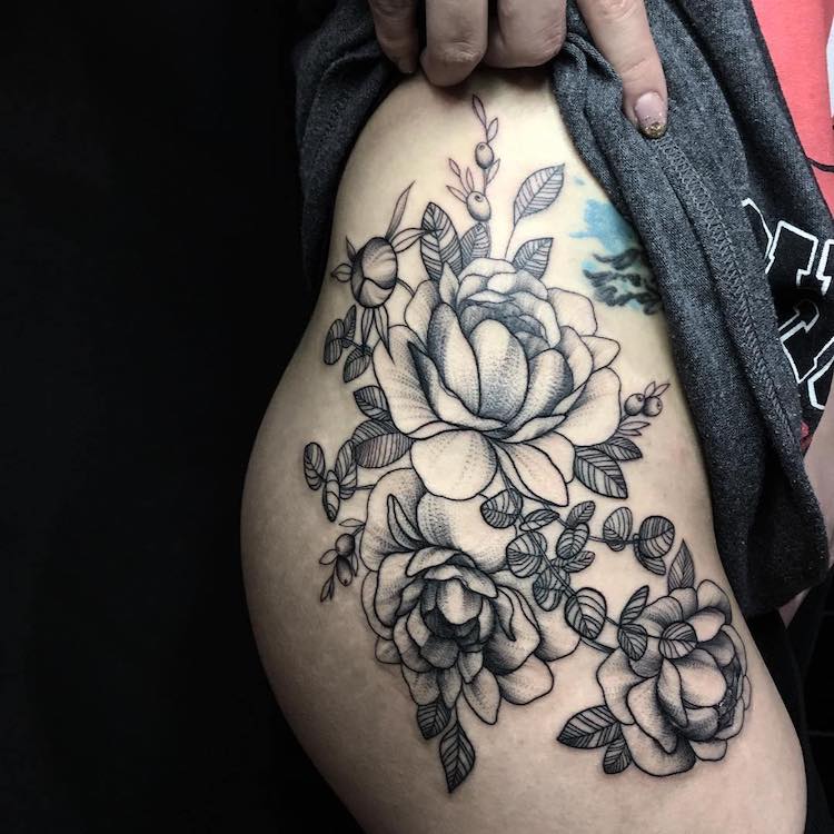 Bold Flower Tattoos Gracefully Drape Across the Body