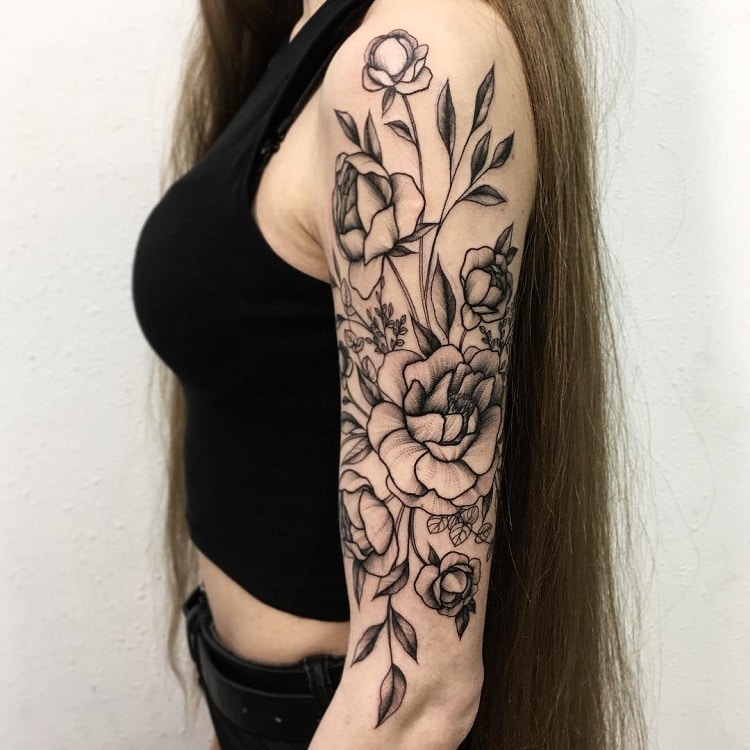 Bold Flower Tattoos Gracefully Drape Across the Body