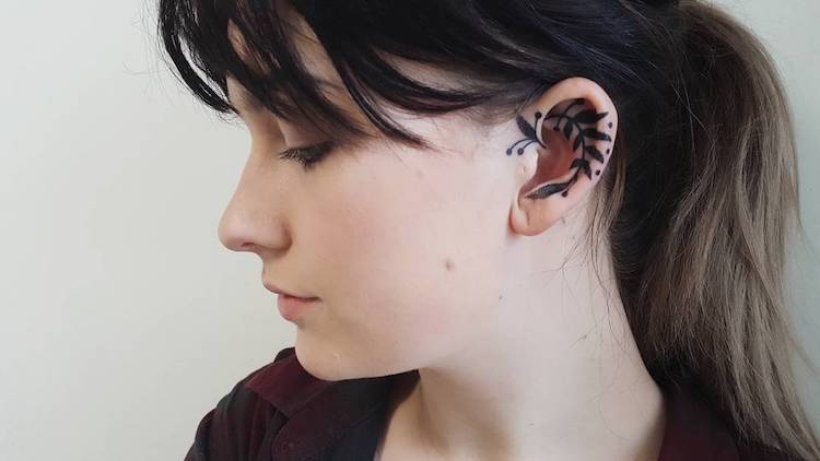 How painful is a tattoo behind the ear? - Quora