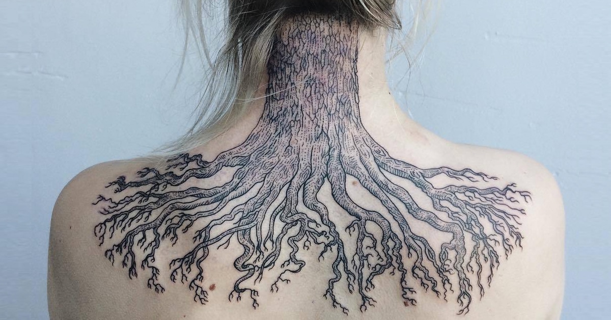 delicate back tattoos
