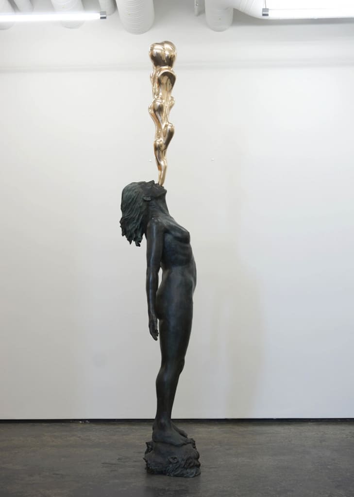 Bronze Sculptures Tell the Story of European Migrants in Search of Utopia