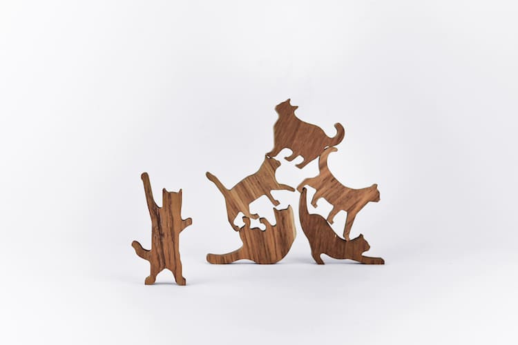 Wooden Cat Pile by Comma