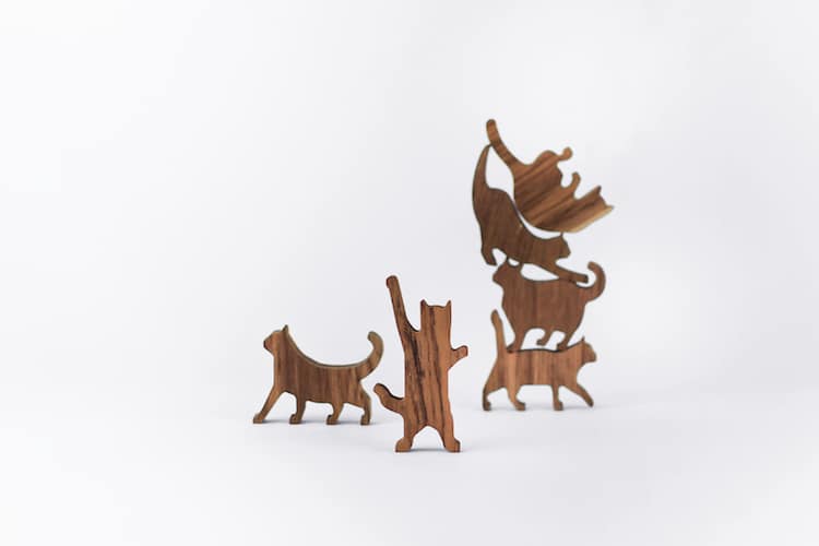 Wooden Cat Pile by Comma