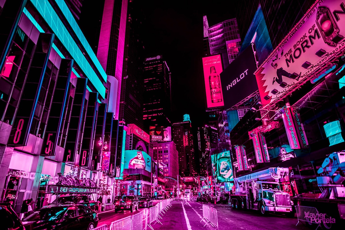 Nighttime Photos Capture Vibrant Pink Glow of Times Square’s Neon Lights