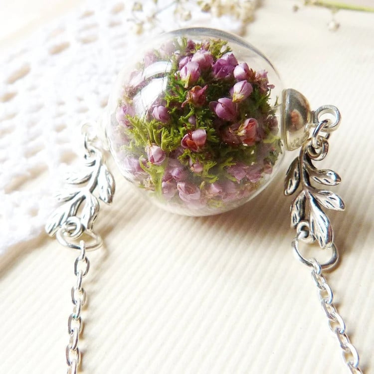 Glass globe necklace with lilac flowers