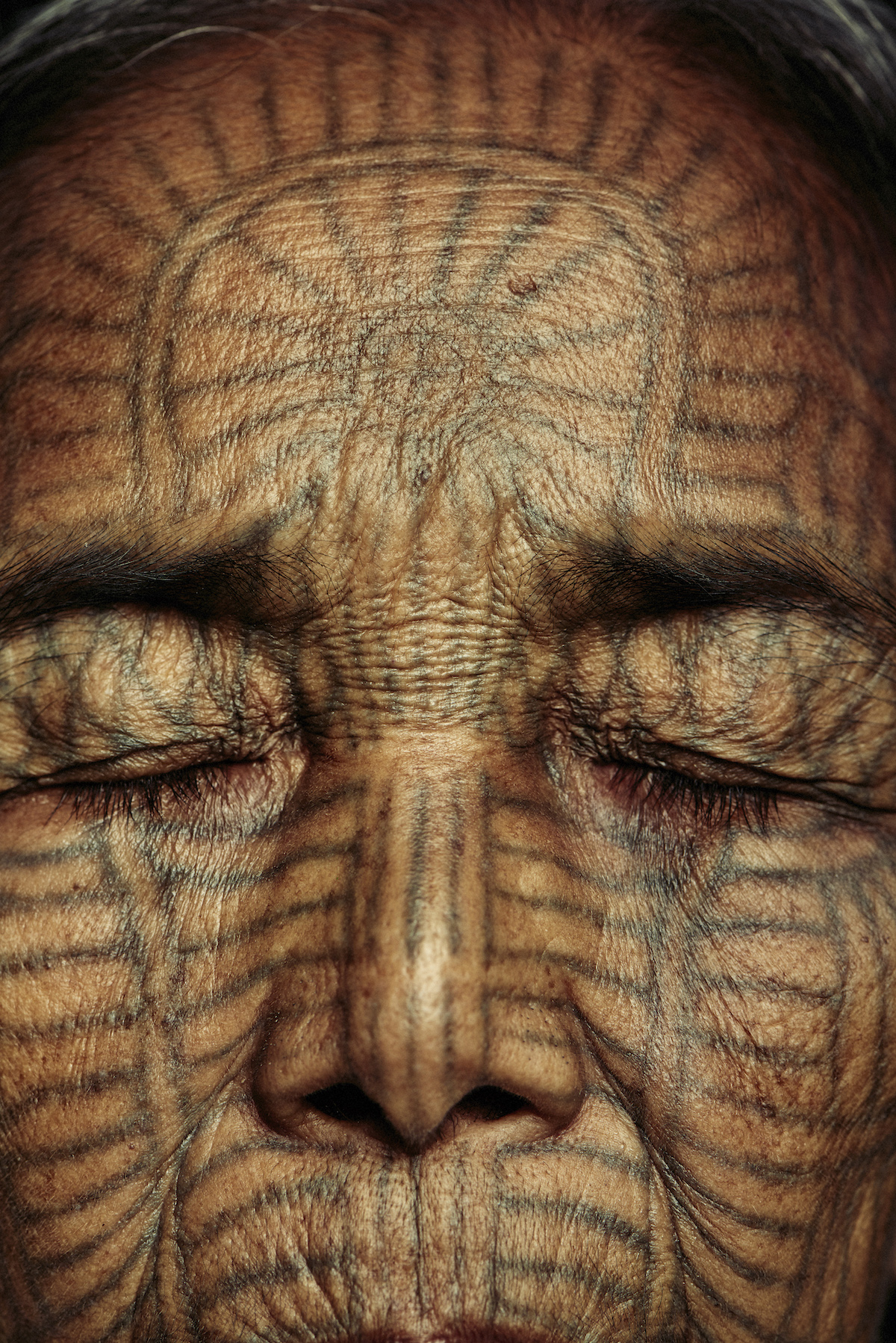 Traditional Chin Facial Tattoos