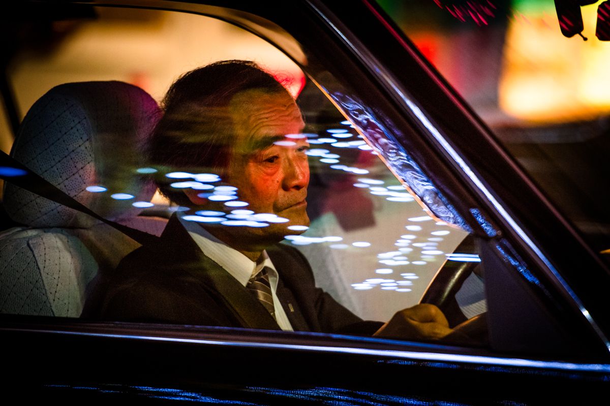 Photo of Cab Driver in Tokyo by Oleg Tolstoy