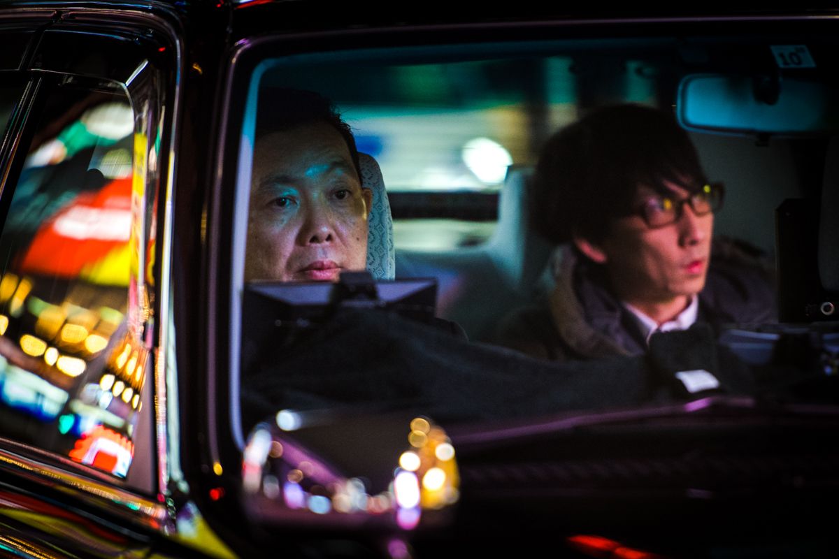 Photo of Taxi Driver in Tokyo by Oleg Tolstoy