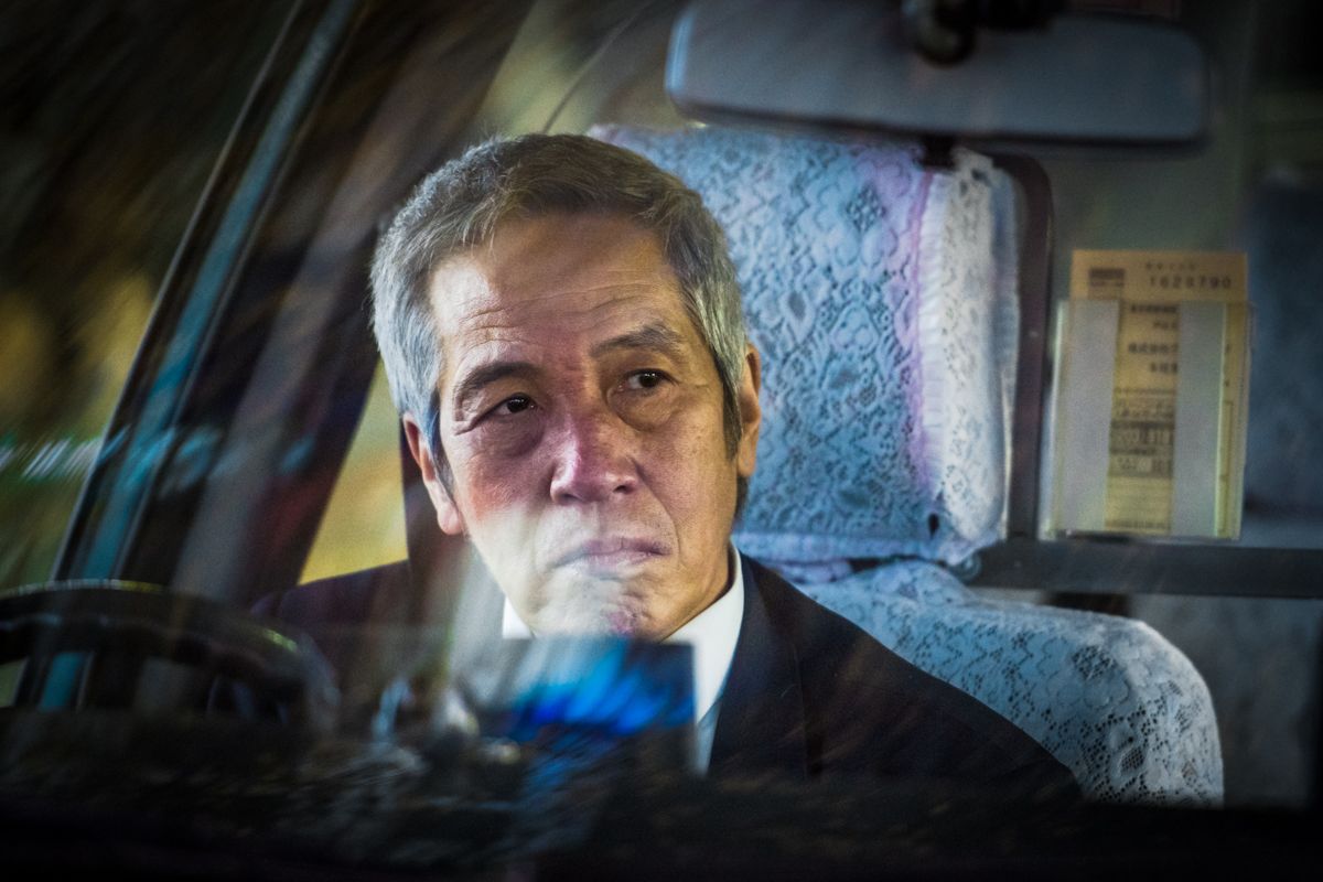 Photo of Taxi Driver in Tokyo by Oleg Tolstoy