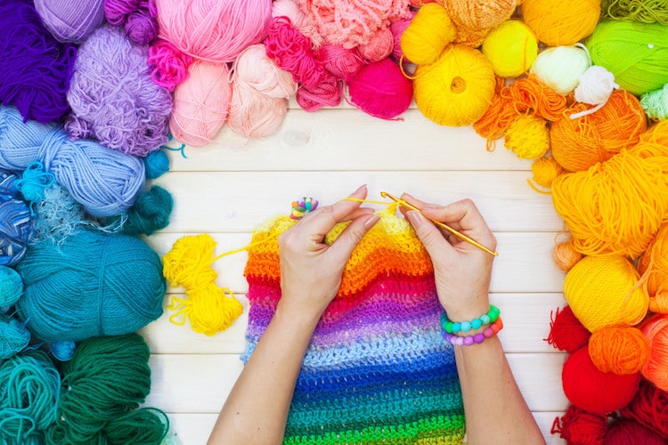 person crocheting