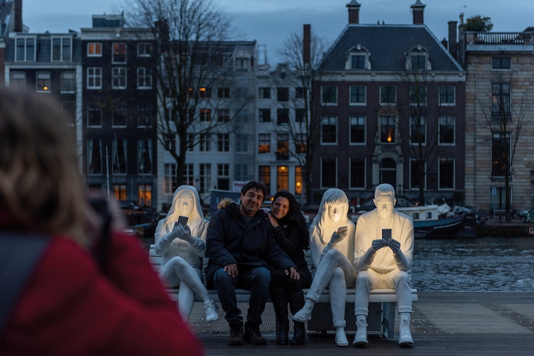 Cell Phone Obsession Sculpture by Design Bridge for Amsterdam Light Festival