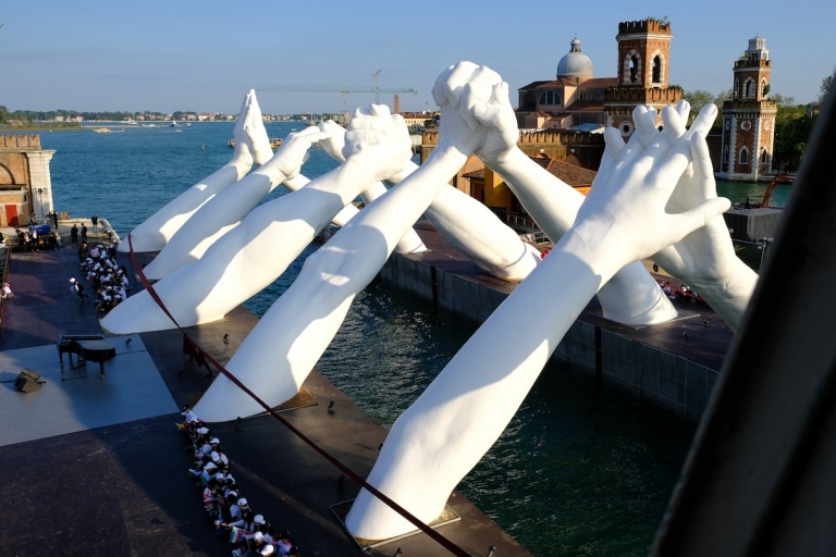 Lorenzo Quinn's Giant Hands Spread Message of Unity in Venice