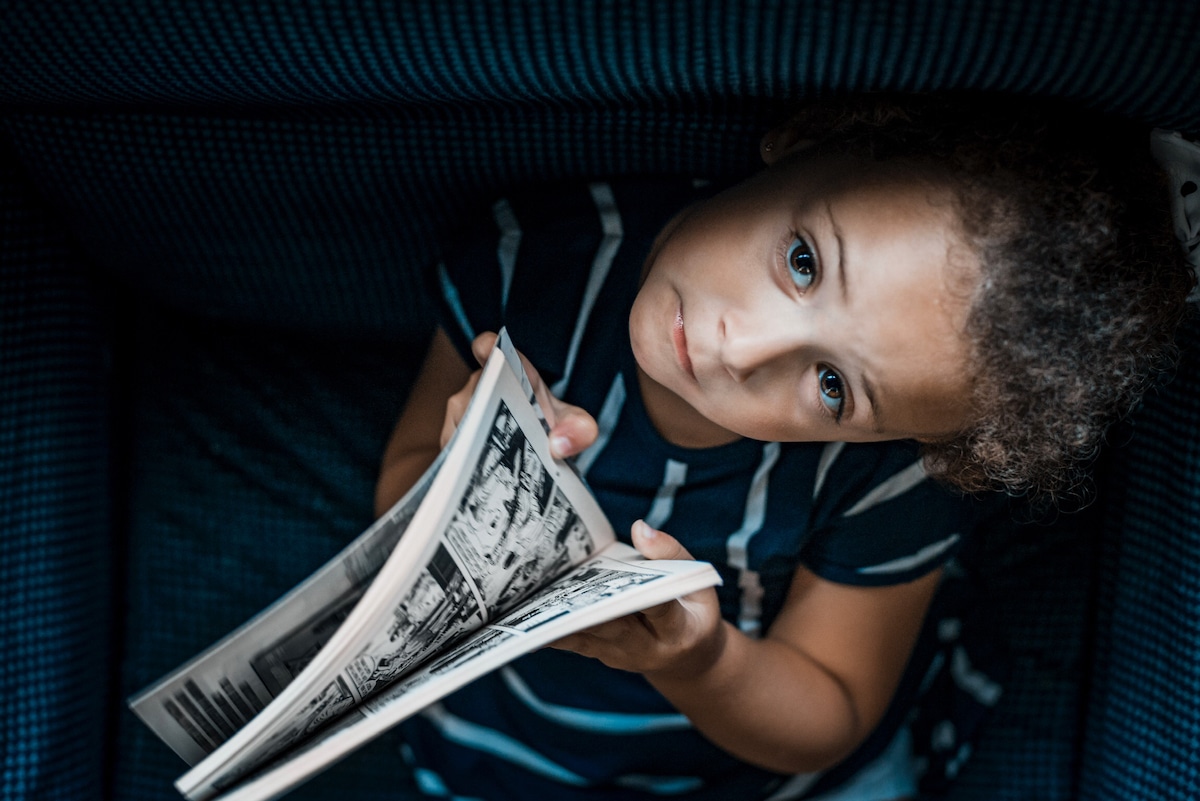 Child Reading a Comic Book