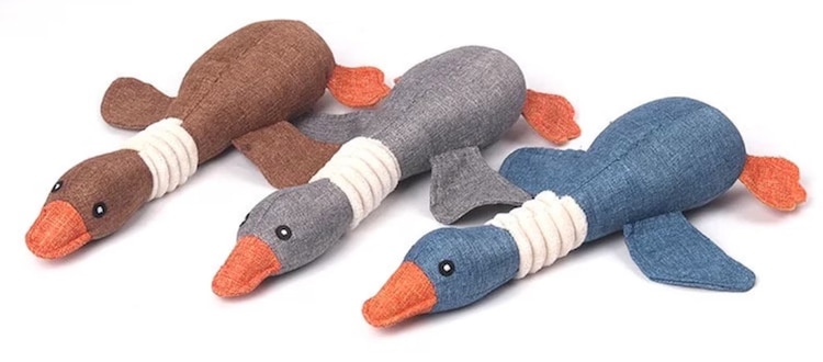 Three squeaky toys for dogs that look like ducks