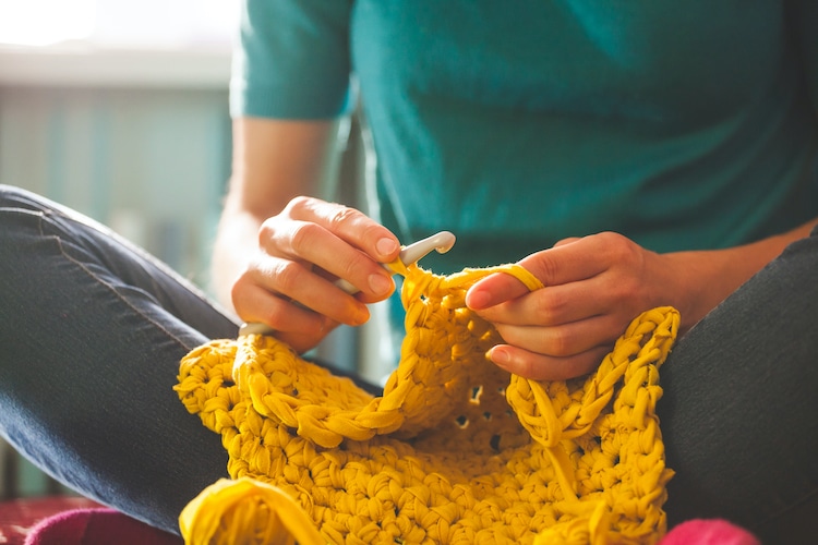 Person Crocheting