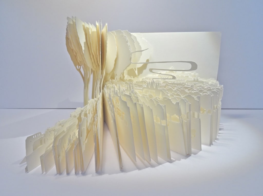 Artist Layers Cut Paper into Stunning 3D Sculptures