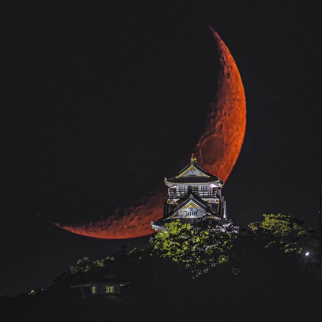 Gifu Castle in Japan with Red Moon Rising