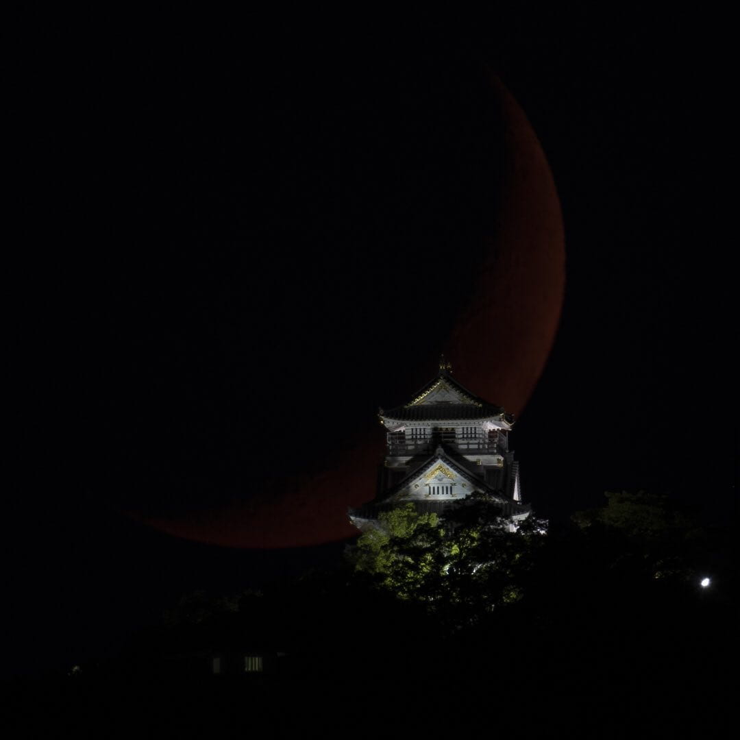 Gifu Castle in Japan with Red Moon Rising