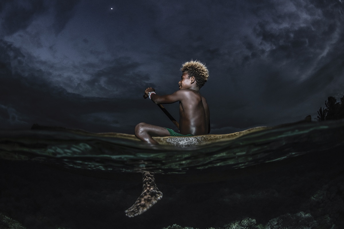 Boy on a Raft in the Solomon Islands
