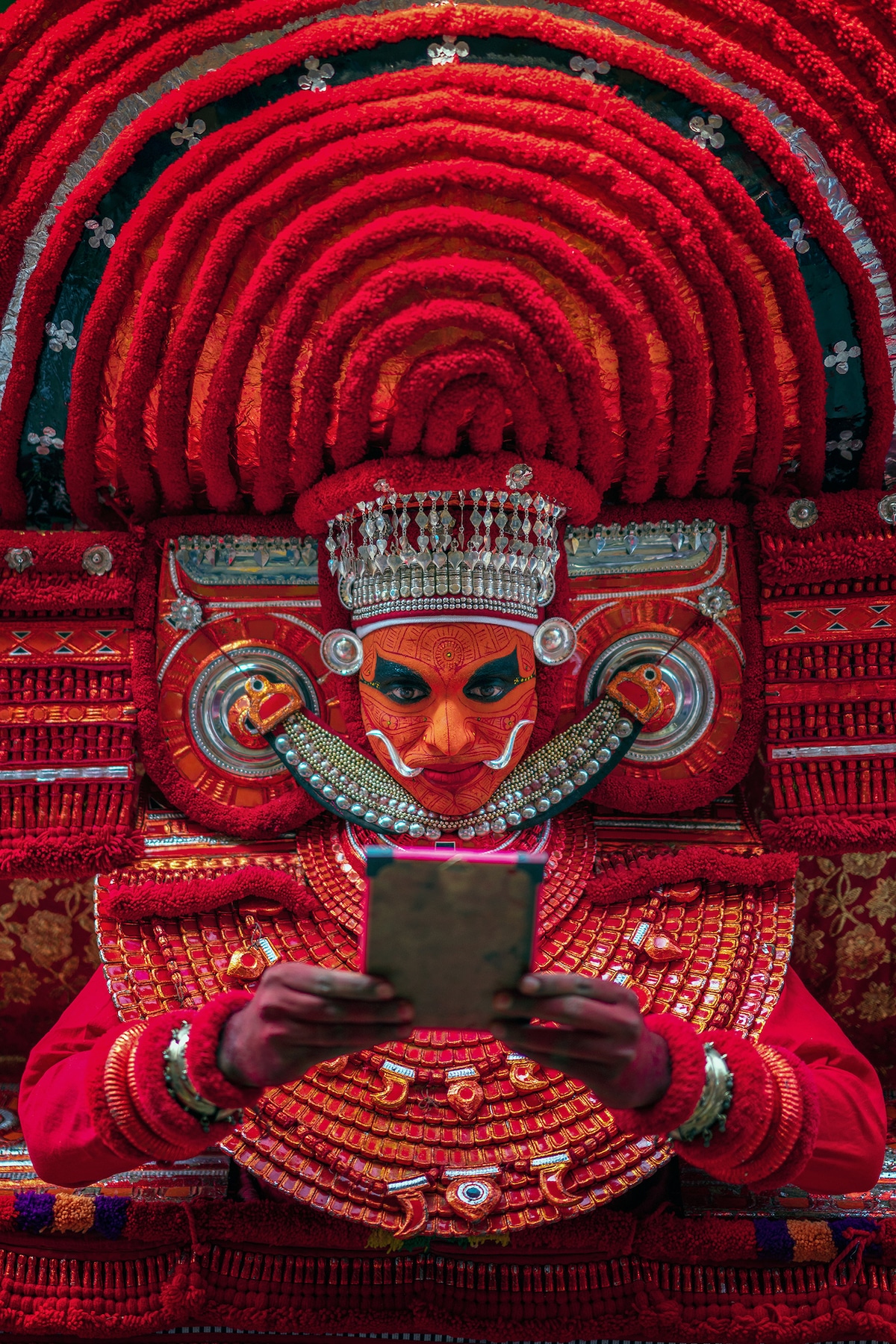 Man Dressed to Perform Theyyam Ritual in the in the north of Kerala, India