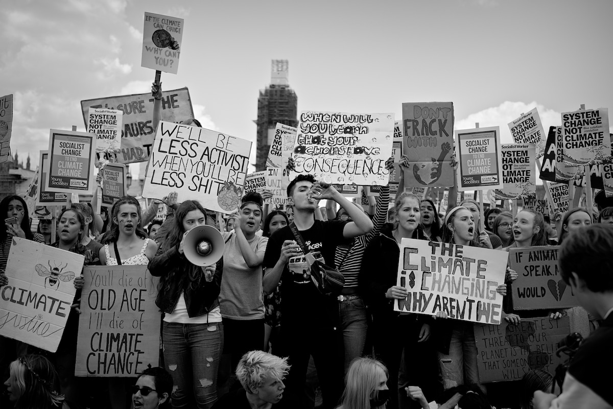 Students Holding Signs at Climate Change Protest