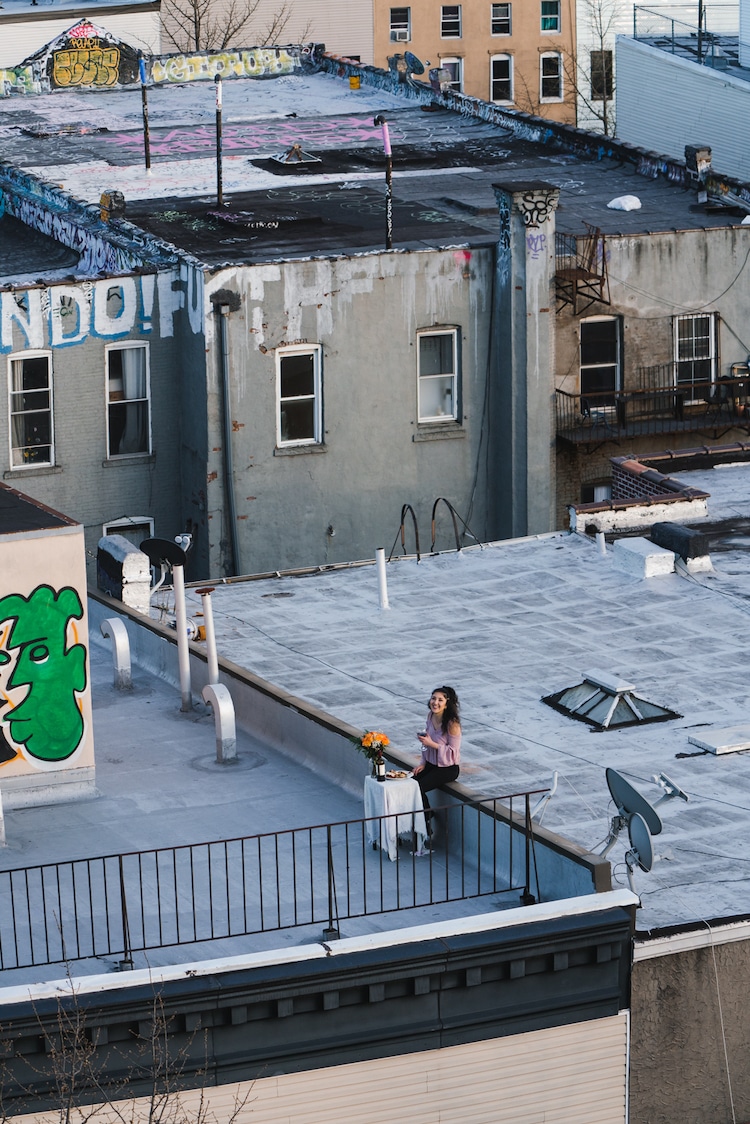 Woman Dining on Her Roof