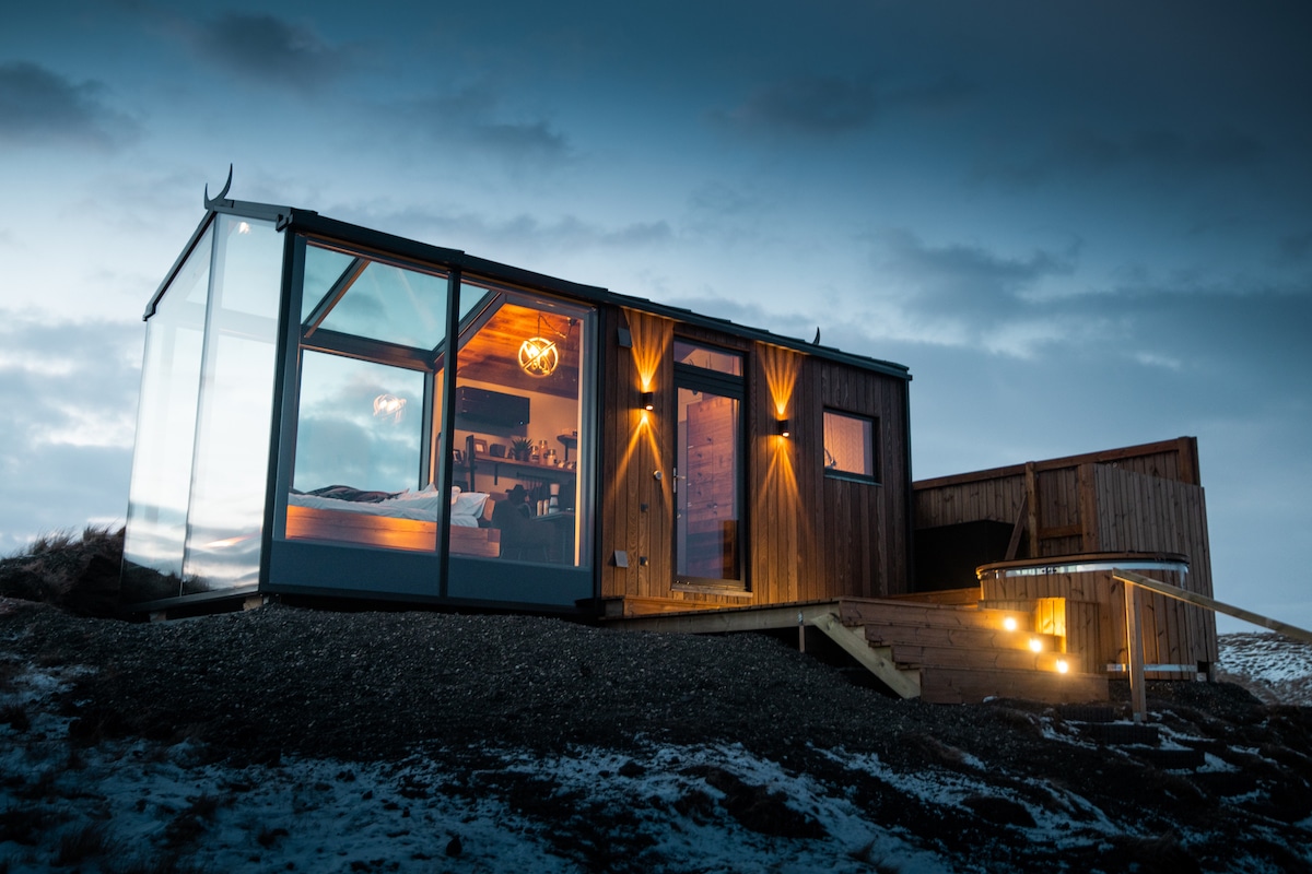 Cozy Glass Cabins Give Sweeping Views of the Icelandic Countryside