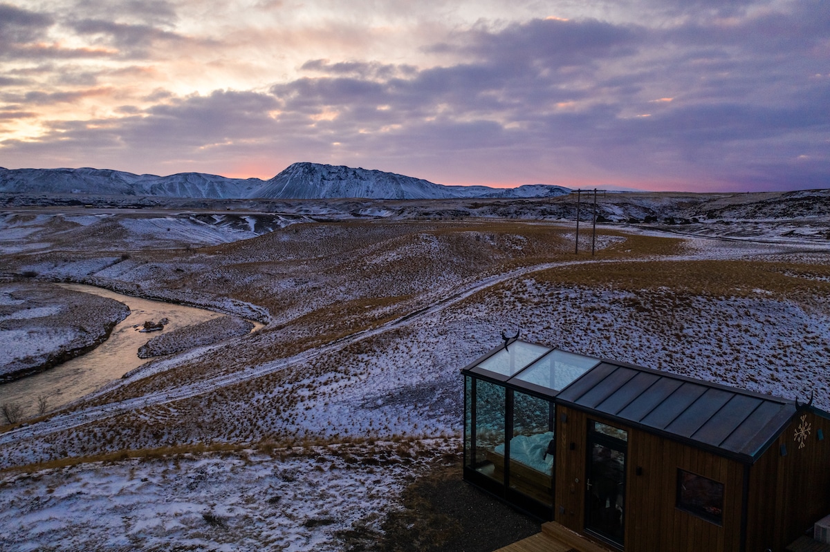 Glass Cabin in Icelandic Landscape