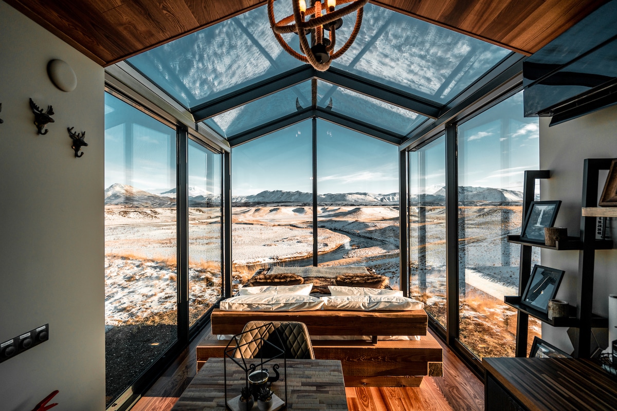 Cozy Glass Cabins Give Sweeping Views of the Icelandic Countryside