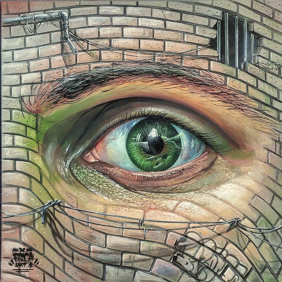 Painted Illusion of an Eye on a Brick Wall