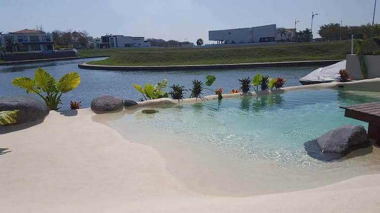 Sand Pool Design Idea Creates a Sandy Oasis in Your Backyard