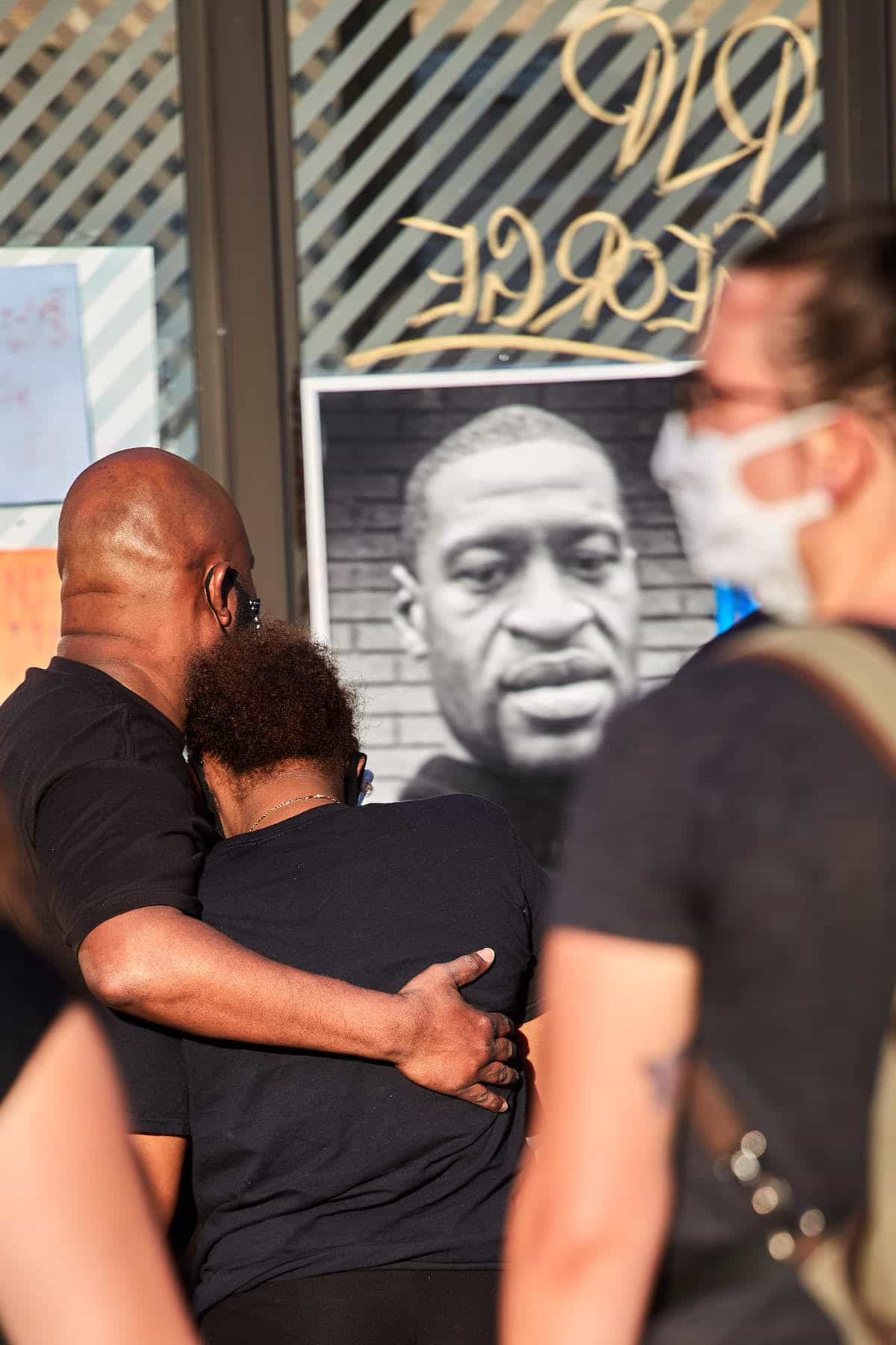 People Comforting Each Other at George Floyd Memorial in Minneapolis