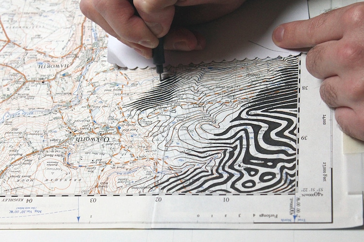 Map Art Sees Faces Emerge From Topographic Contours And Patterns