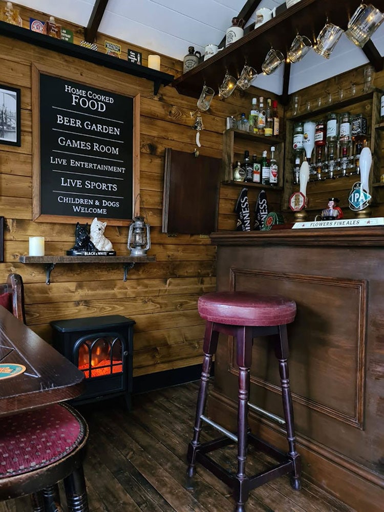 This Family's Tiny Garden Pub Looks Just Like a Real Bar Inside