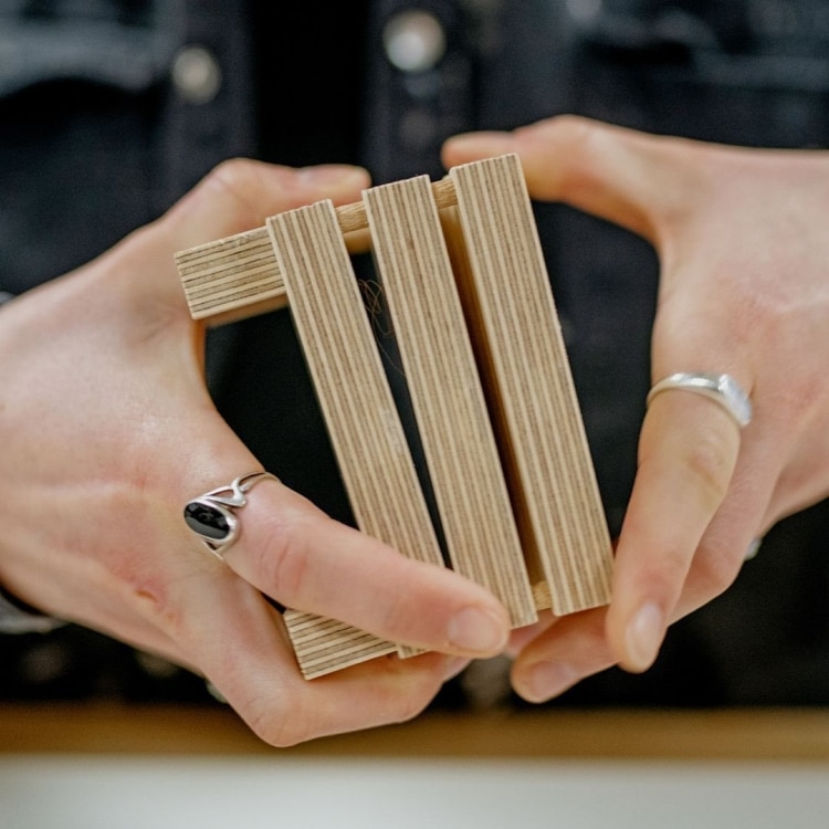 Hands Assembling A Bee Home