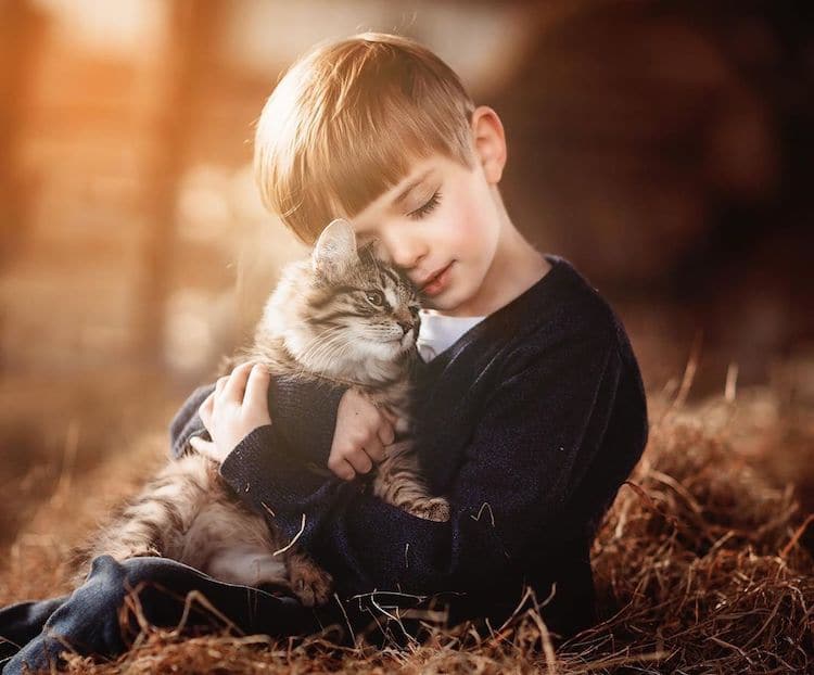 Adorable Children With Baby Animal Photos Showcase Sweet Bonds