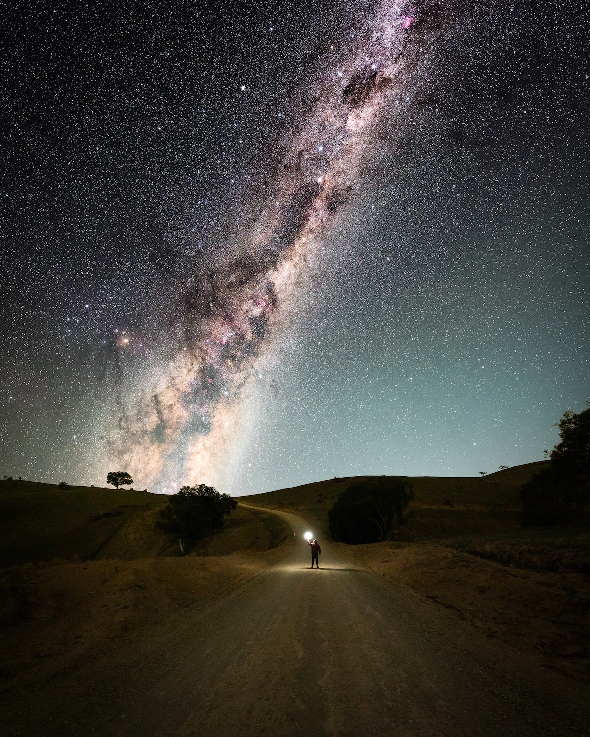 Man Standing Under the Milky Way